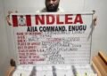 NDLEA officers and recovered cocaine wraps at Enugu Airport
