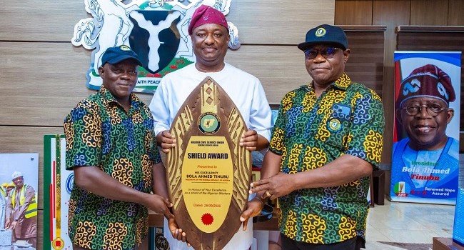 Tinubu Receives NCSU Shield Award as Labour Issues Remain in Focus
